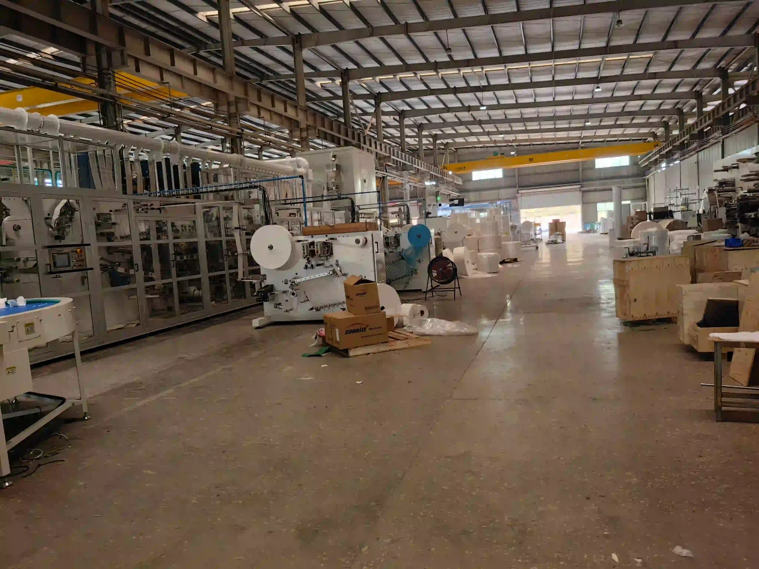 Full servo sanitary pad machine factory